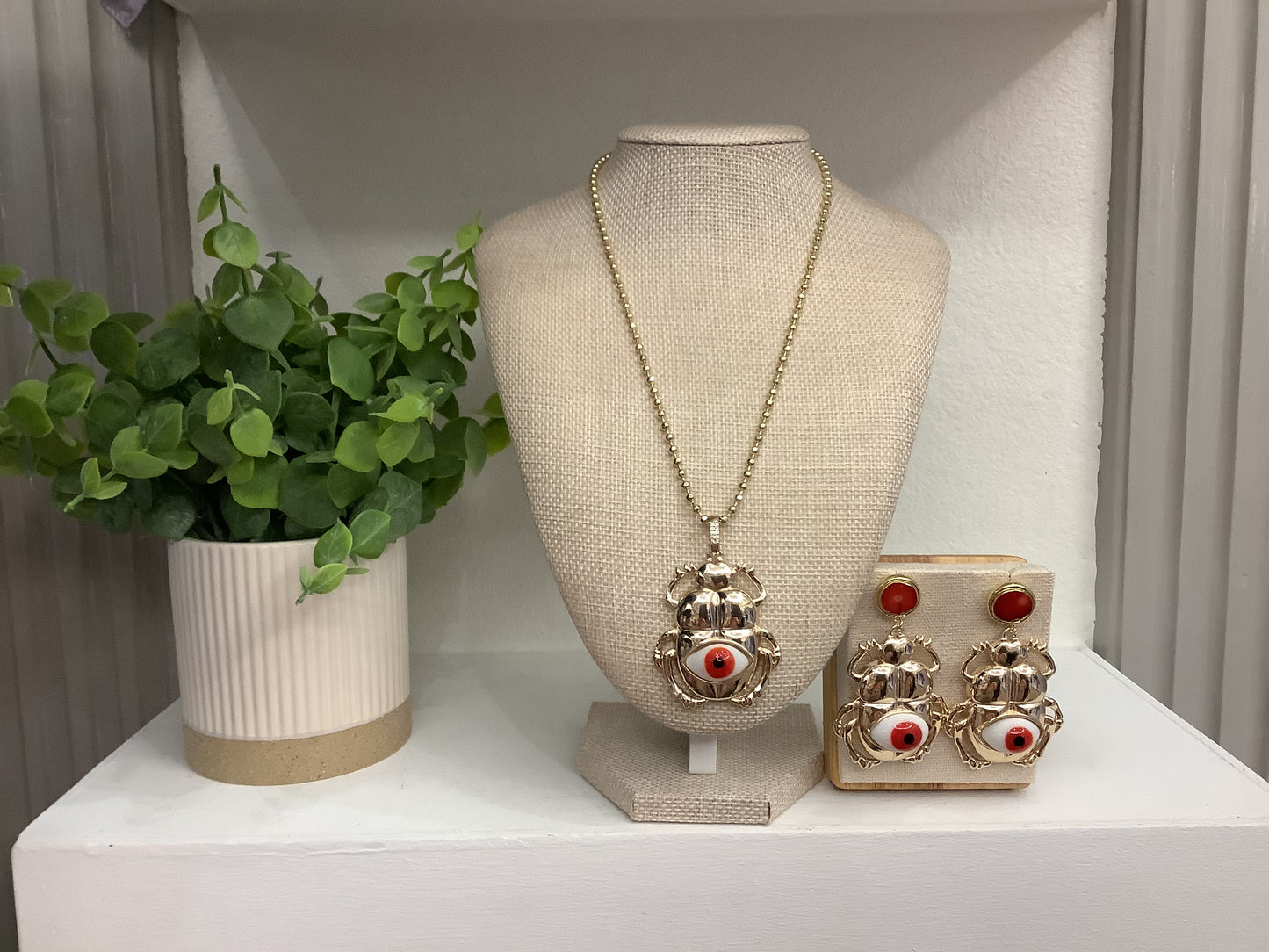 Gold plated “Balines” set with red Scarab Beetle pendant (16”)