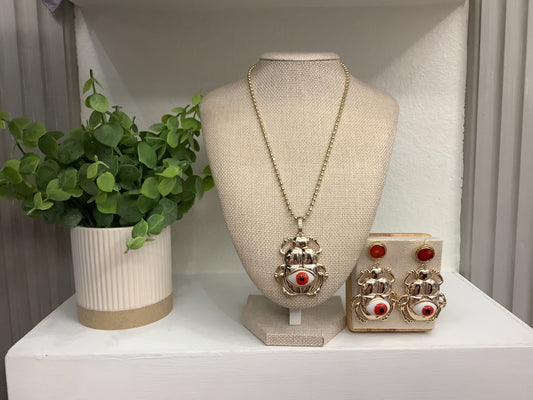 Gold plated “Balines” set with red Scarab Beetle pendant (16”)