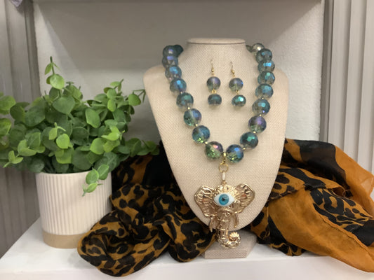 Gold plated “Crystals “ set with light blue evil eye Elephant pendant  (16” plus a two inch extender)